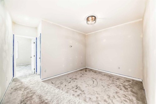 524 Heritage Boulevard, Cochrane, AB - Indoor Photo Showing Other Room