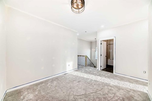 524 Heritage Boulevard, Cochrane, AB - Indoor Photo Showing Other Room