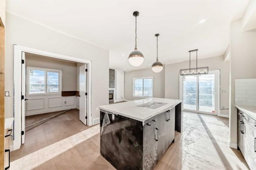 524 Heritage Boulevard, Cochrane, AB - Indoor Photo Showing Kitchen