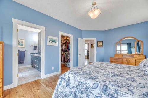 23 Winters Place, Rural Rocky View County, AB - Indoor Photo Showing Bedroom