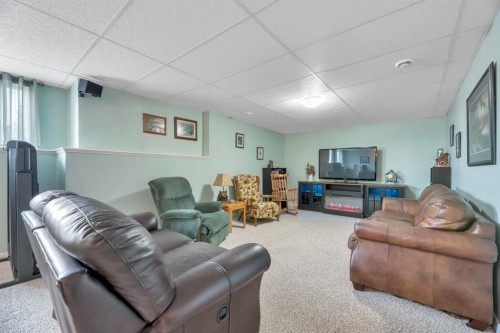 23 Winters Place, Rural Rocky View County, AB - Indoor Photo Showing Gym Room