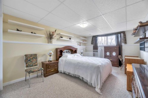 23 Winters Place, Rural Rocky View County, AB - Indoor Photo Showing Bedroom
