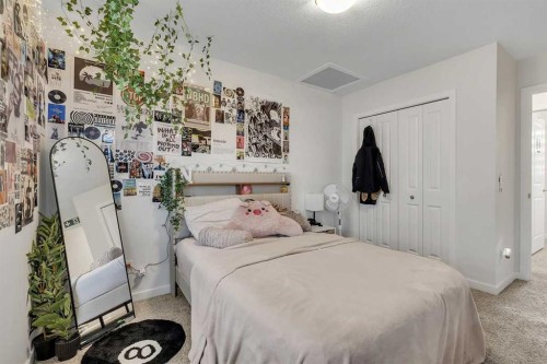 260 Lucas Way Nw, Calgary, AB - Indoor Photo Showing Bedroom