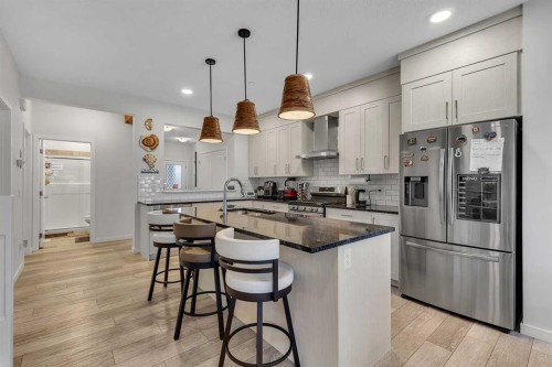 260 Lucas Way Nw, Calgary, AB - Indoor Photo Showing Kitchen With Stainless Steel Kitchen With Upgraded Kitchen