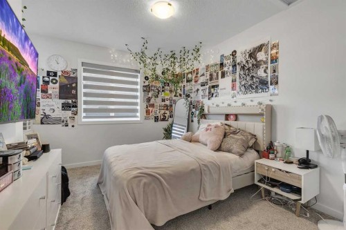 260 Lucas Way Nw, Calgary, AB - Indoor Photo Showing Bedroom