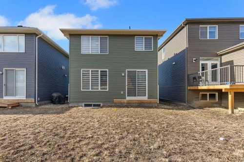 260 Lucas Way Nw, Calgary, AB - Outdoor With Exterior