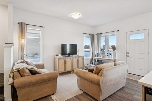 101-24 Rivercrest Drive, Cochrane, AB - Indoor Photo Showing Living Room