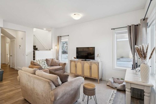 101-24 Rivercrest Drive, Cochrane, AB - Indoor Photo Showing Living Room