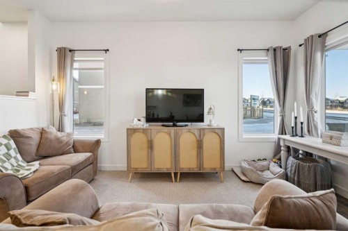 101-24 Rivercrest Drive, Cochrane, AB - Indoor Photo Showing Living Room