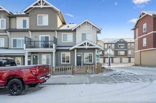 101-24 Rivercrest Drive, Cochrane, AB - Outdoor With Facade