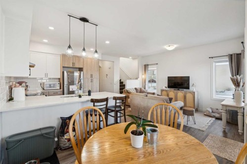 101-24 Rivercrest Drive, Cochrane, AB - Indoor Photo Showing Dining Room