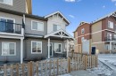 101-24 Rivercrest Drive, Cochrane, AB  - Outdoor With Facade 