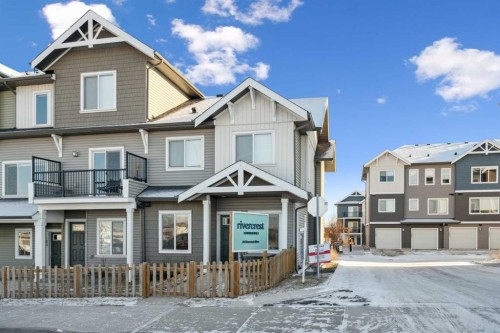 101-24 Rivercrest Drive, Cochrane, AB - Outdoor With Facade