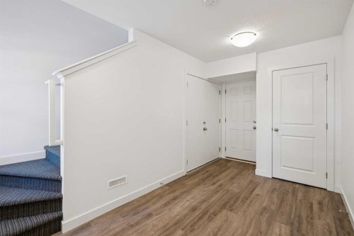 903-24 Rivercrest Drive, Cochrane, AB - Indoor Photo Showing Other Room