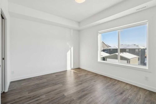 903-24 Rivercrest Drive, Cochrane, AB - Indoor Photo Showing Other Room