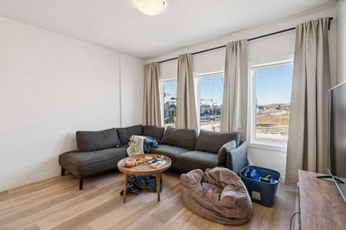 1502-24 Rivercrest Drive, Cochrane, AB - Indoor Photo Showing Living Room