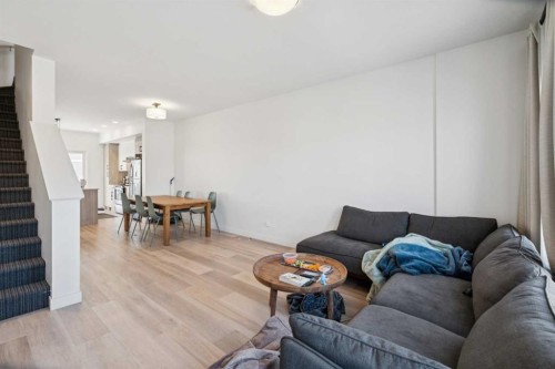 1502-24 Rivercrest Drive, Cochrane, AB - Indoor Photo Showing Living Room