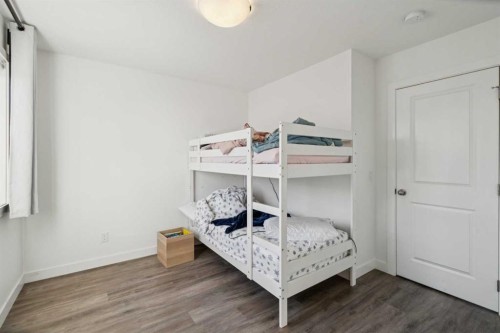 1502-24 Rivercrest Drive, Cochrane, AB - Indoor Photo Showing Bedroom