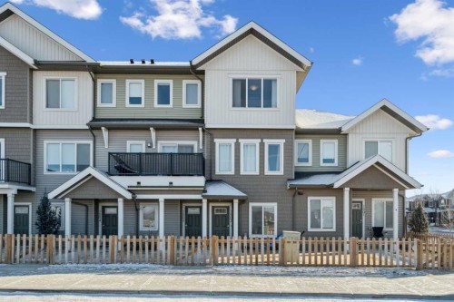 1502-24 Rivercrest Drive, Cochrane, AB - Outdoor With Facade