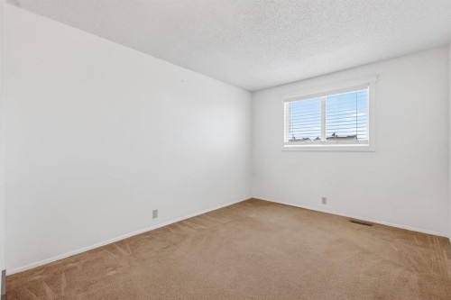 115 Abingdon Court Ne, Calgary, AB - Indoor Photo Showing Other Room