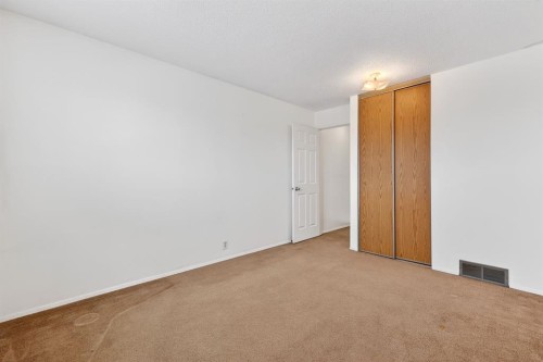 115 Abingdon Court Ne, Calgary, AB - Indoor Photo Showing Other Room