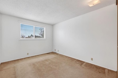 115 Abingdon Court Ne, Calgary, AB - Indoor Photo Showing Other Room