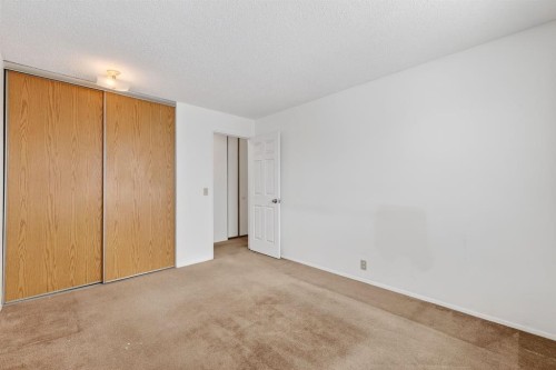 115 Abingdon Court Ne, Calgary, AB - Indoor Photo Showing Other Room