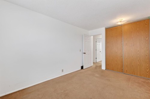 115 Abingdon Court Ne, Calgary, AB - Indoor Photo Showing Other Room