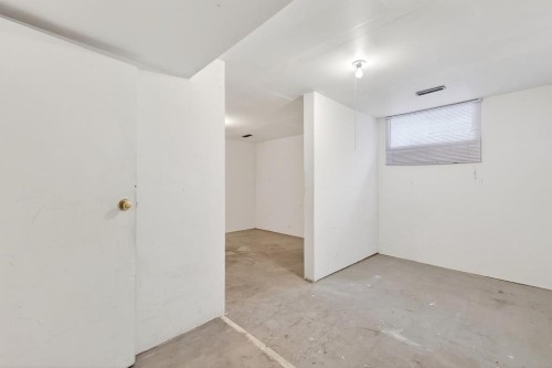 115 Abingdon Court Ne, Calgary, AB - Indoor Photo Showing Other Room