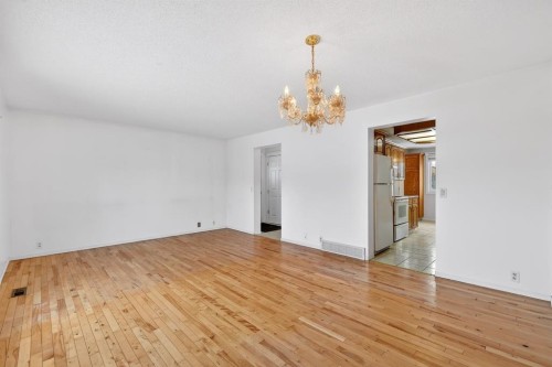 115 Abingdon Court Ne, Calgary, AB - Indoor Photo Showing Other Room