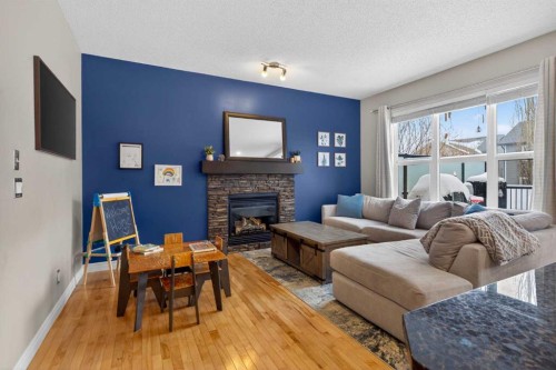 61 Sage Valley Manor Nw, Calgary, AB - Indoor Photo Showing Living Room With Fireplace