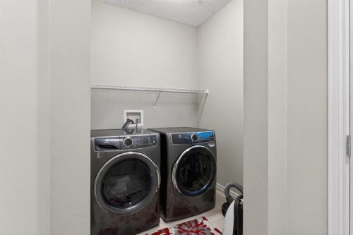 61 Sage Valley Manor Nw, Calgary, AB - Indoor Photo Showing Laundry Room