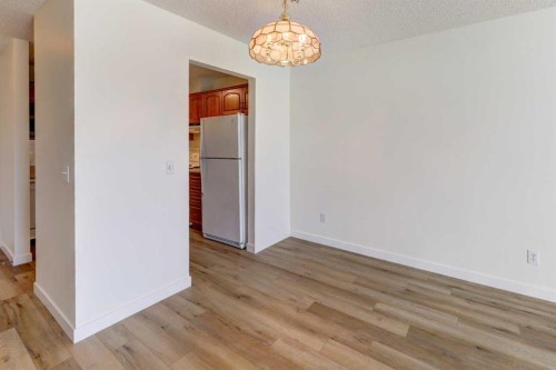 309-3309 Hawksbrow Point Nw, Calgary, AB - Indoor Photo Showing Other Room