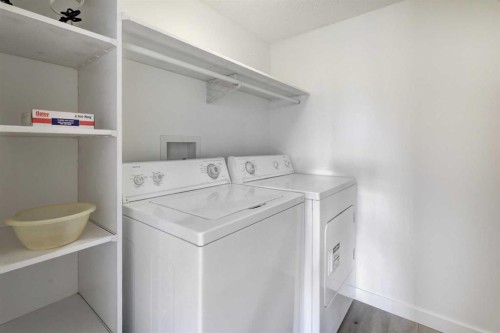 309-3309 Hawksbrow Point Nw, Calgary, AB - Indoor Photo Showing Laundry Room