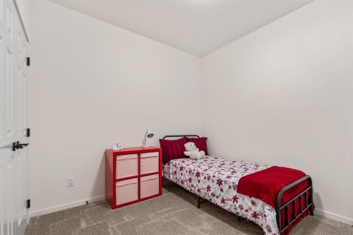 6302-151 Legacy Main Street Se, Calgary, AB - Indoor Photo Showing Bedroom