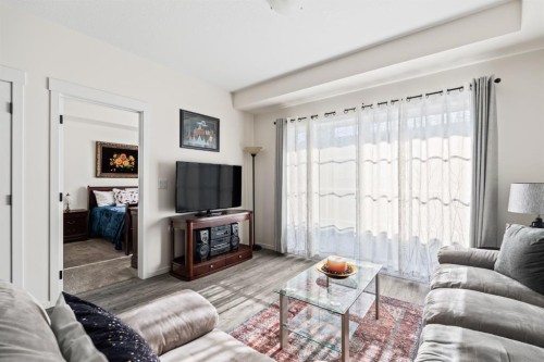 6302-151 Legacy Main Street Se, Calgary, AB - Indoor Photo Showing Living Room