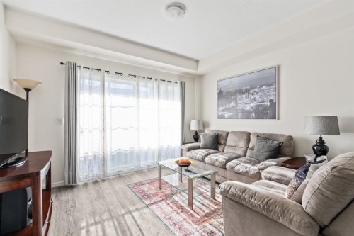 6302-151 Legacy Main Street Se, Calgary, AB - Indoor Photo Showing Living Room