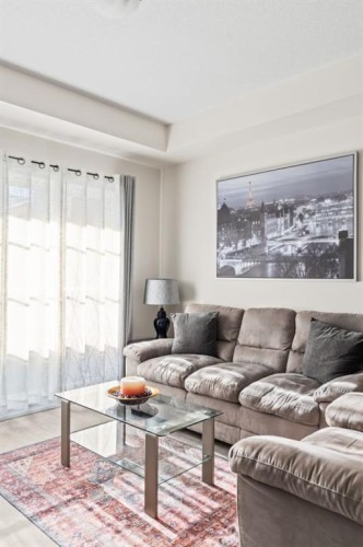 6302-151 Legacy Main Street Se, Calgary, AB - Indoor Photo Showing Living Room