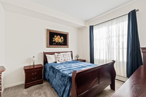 6302-151 Legacy Main Street Se, Calgary, AB - Indoor Photo Showing Bedroom