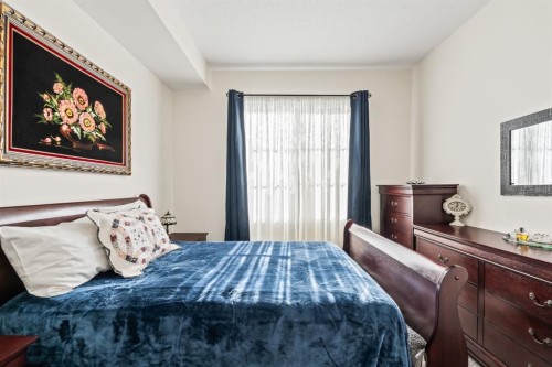 6302-151 Legacy Main Street Se, Calgary, AB - Indoor Photo Showing Bedroom