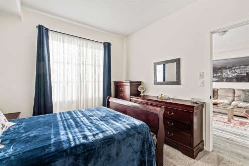 6302-151 Legacy Main Street Se, Calgary, AB - Indoor Photo Showing Bedroom