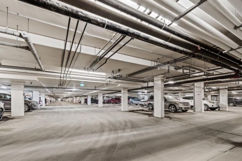 6302-151 Legacy Main Street Se, Calgary, AB - Indoor Photo Showing Garage