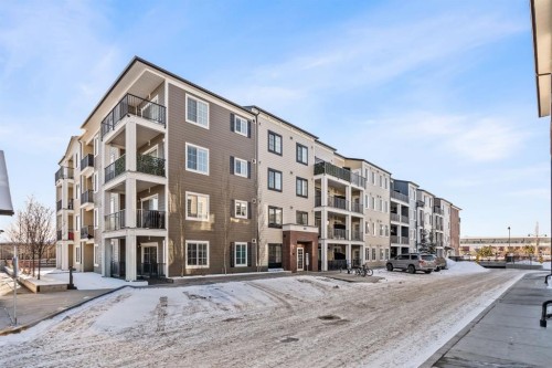 6302-151 Legacy Main Street Se, Calgary, AB - Outdoor With Facade