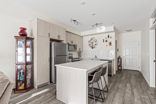 6302-151 Legacy Main Street Se, Calgary, AB - Indoor Photo Showing Kitchen With Stainless Steel Kitchen