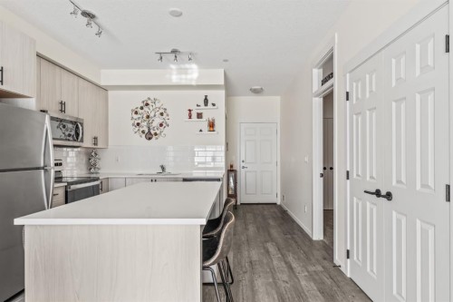 6302-151 Legacy Main Street Se, Calgary, AB - Indoor Photo Showing Kitchen