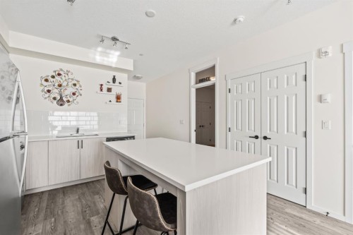 6302-151 Legacy Main Street Se, Calgary, AB - Indoor Photo Showing Kitchen