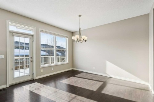 33 Sundown Grove, Cochrane, AB - Indoor Photo Showing Other Room