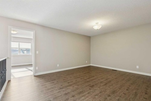 33 Sundown Grove, Cochrane, AB - Indoor Photo Showing Other Room