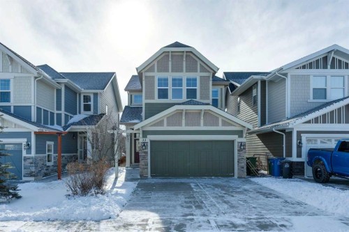 33 Sundown Grove, Cochrane, AB - Outdoor With Facade