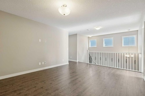 33 Sundown Grove, Cochrane, AB - Indoor Photo Showing Other Room